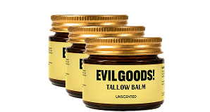 Three small amber glass jars of Evilgoods! Unscented Tallow Balm with gold lids against a white background.