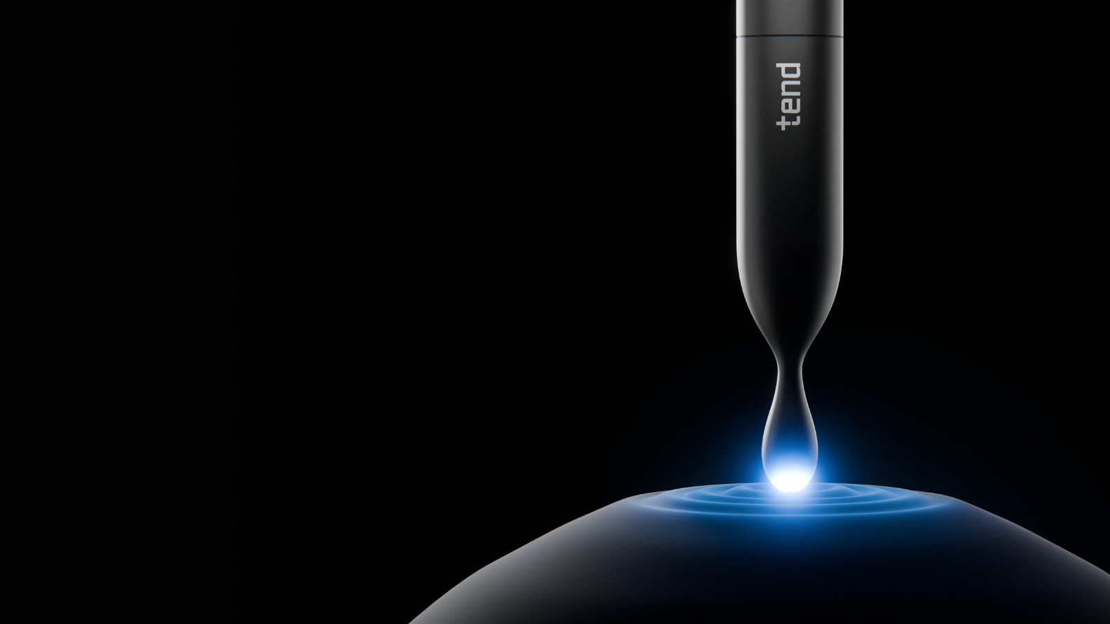 Black device with 'tend' logo, emitting blue light onto a surface.