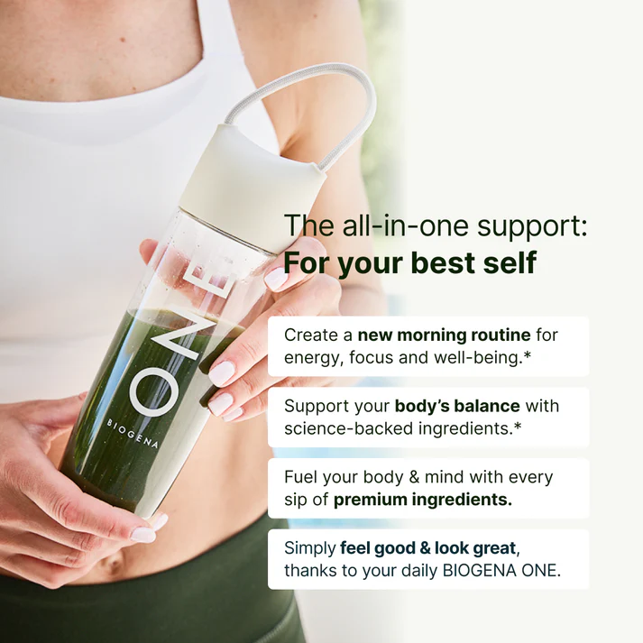 Person holding a bottle of green drink with motivational text about health.