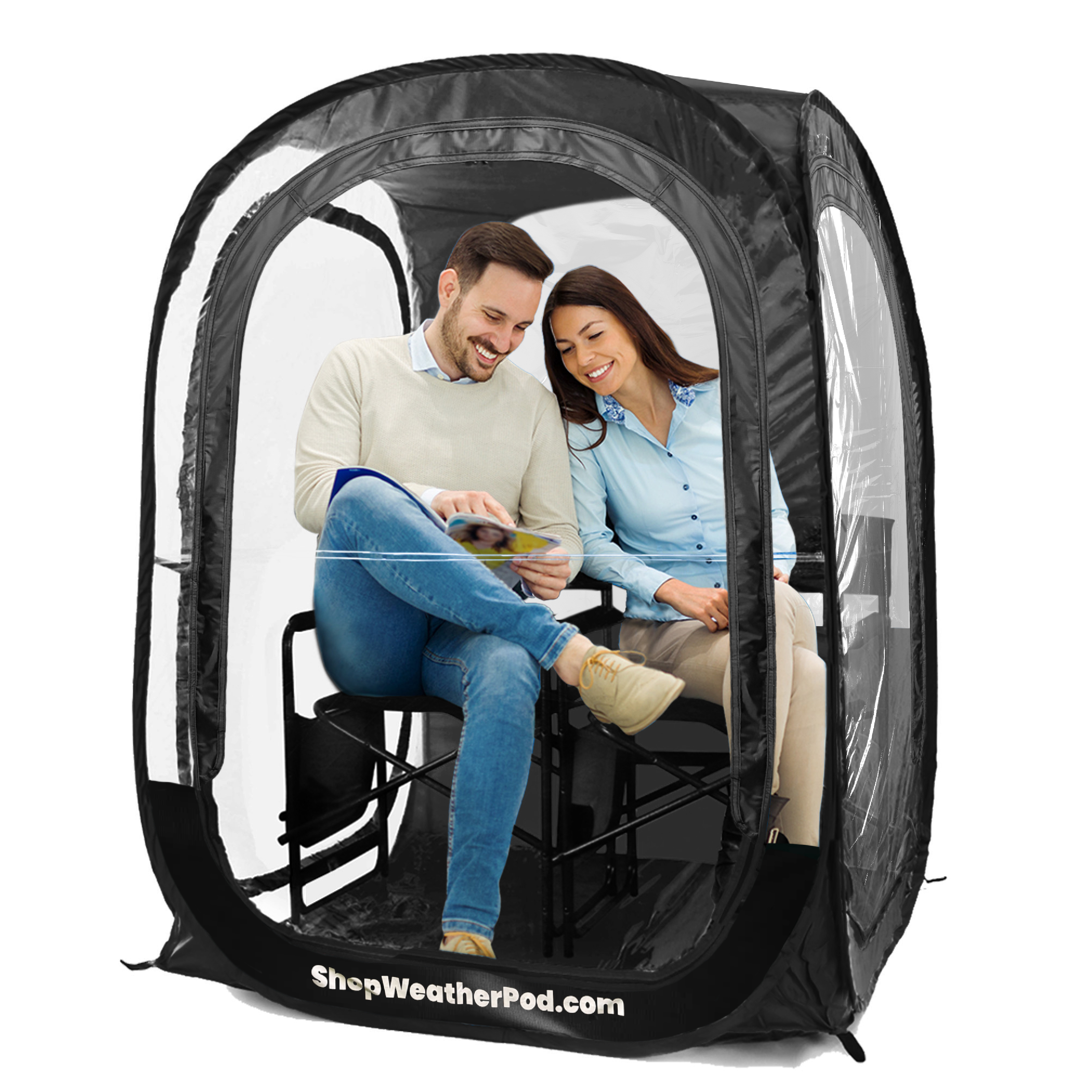 A man and woman sit smiling inside a black pop-up weather pod with clear plastic windows.