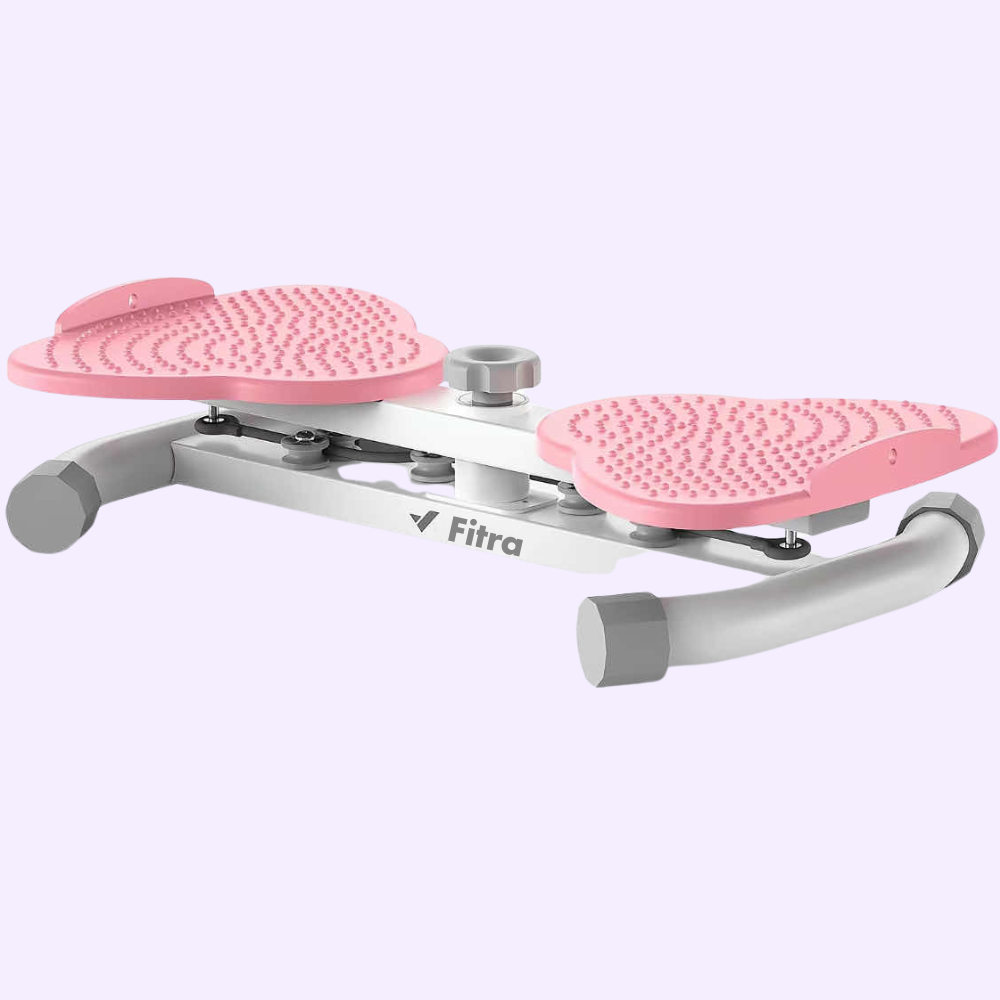 Pink foot massager with textured surface and metal frame on light background.