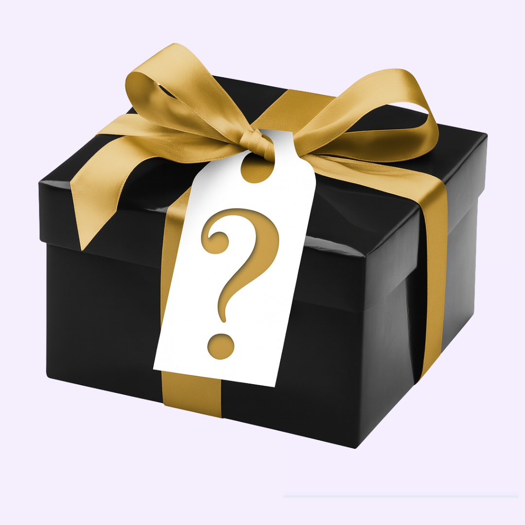 Black gift box with gold ribbon and a question mark tag.