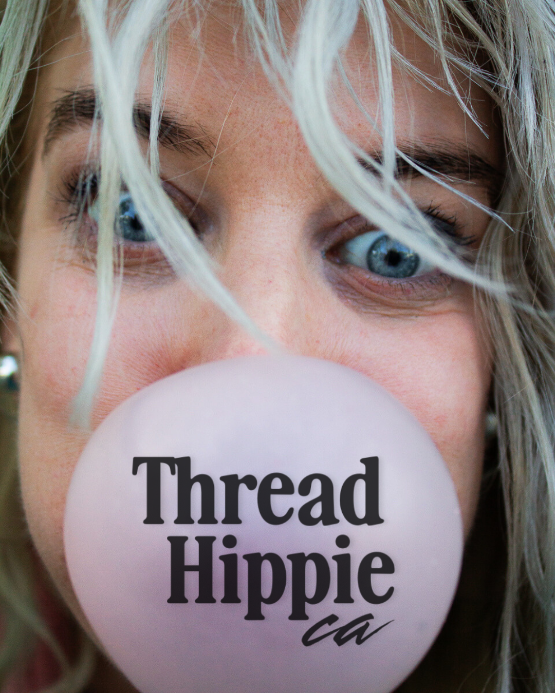 Close-up of a person blowing a pink bubble with 'Thread Hippie' text.