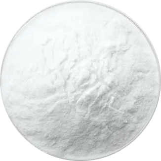 A top-down view of a circular dish filled with a lumpy white powder.