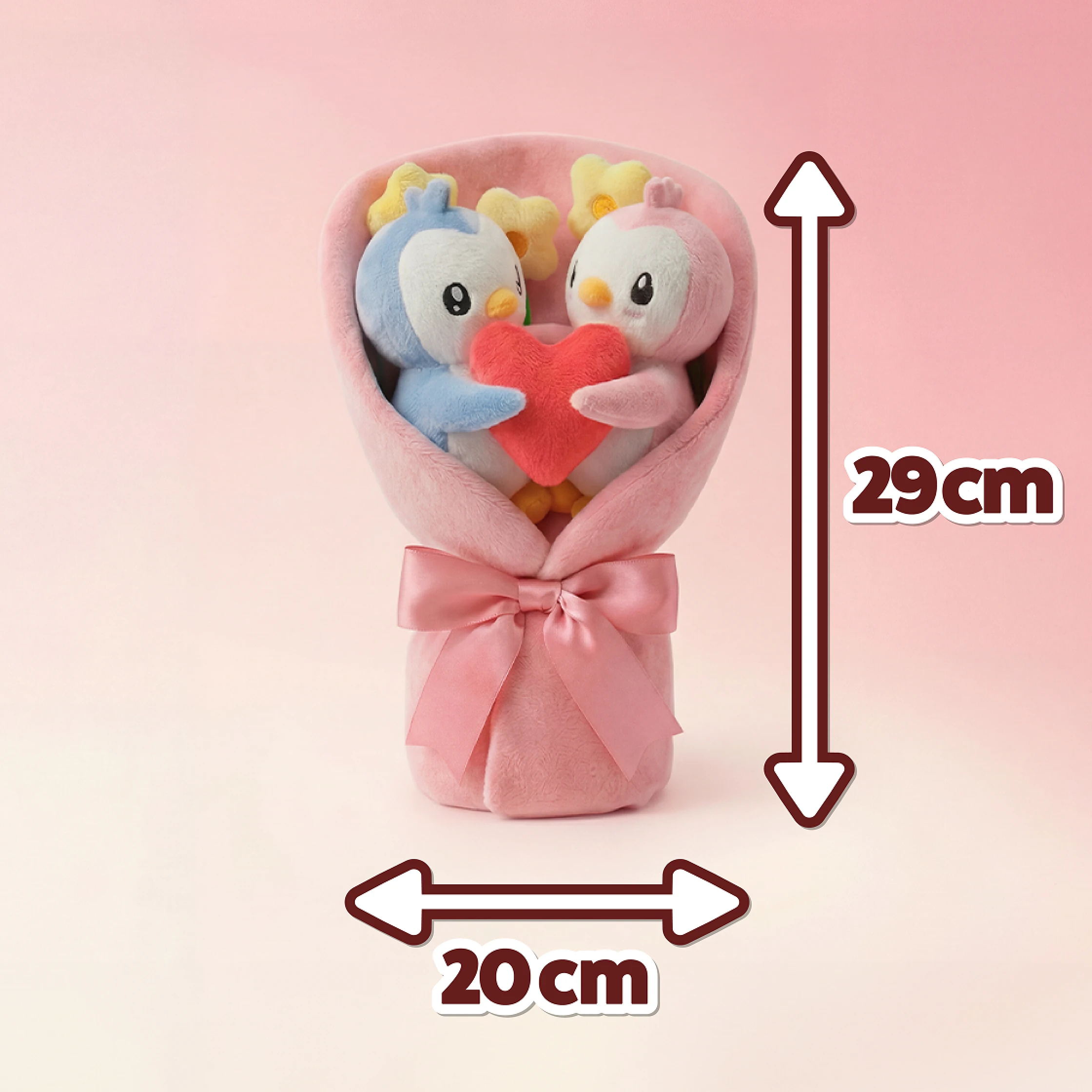 A plush toy bouquet of two penguins holding a heart, with dimensions of 29cm by 20cm.