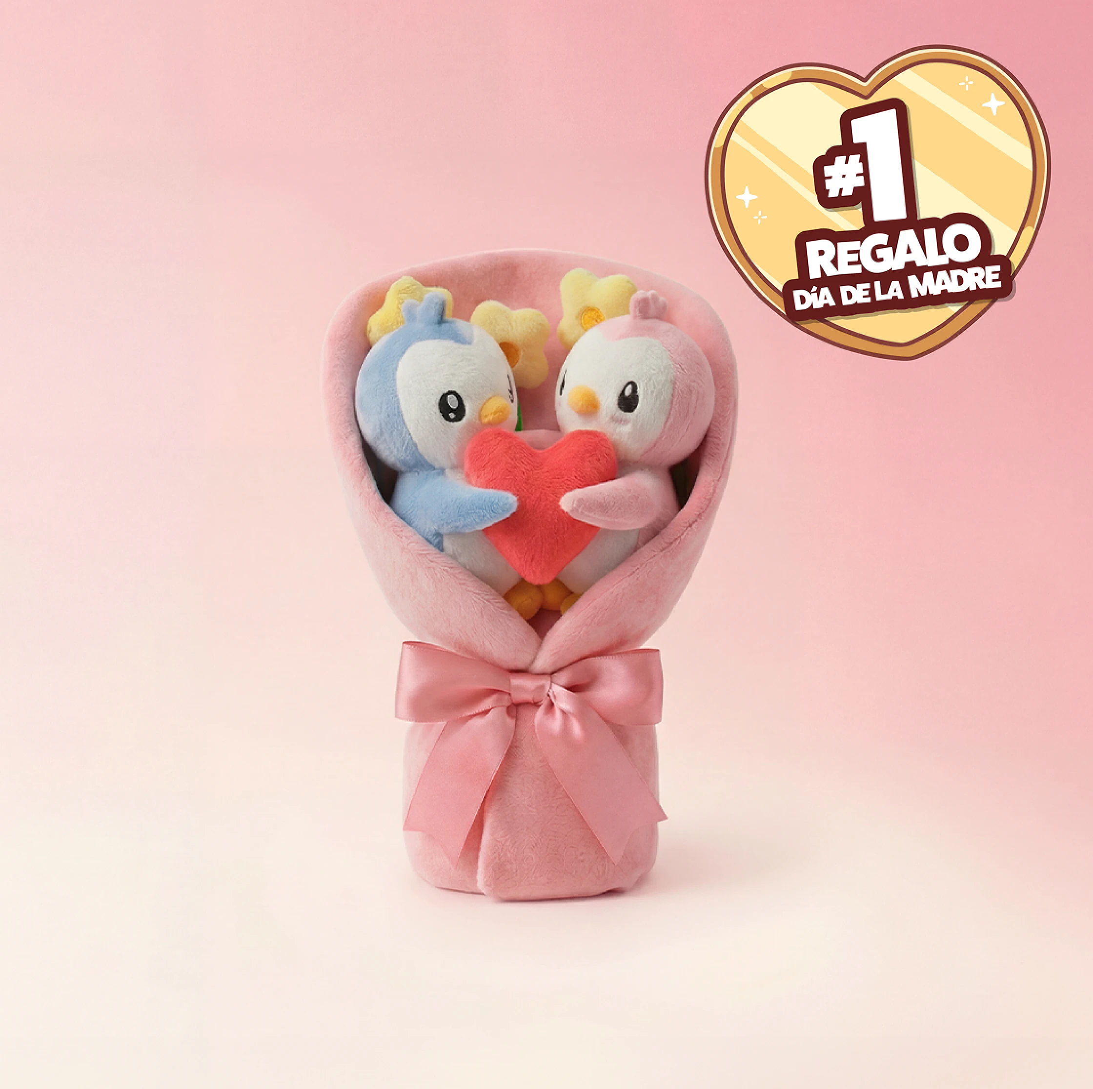 A plush bouquet featuring a blue and a pink penguin holding a red heart together.