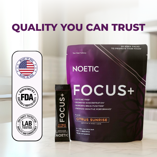 Purple Focus+ supplement packaging with quality assurance badges on a kitchen counter.