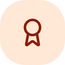 A dark red icon of an award ribbon inside a light orange circle.