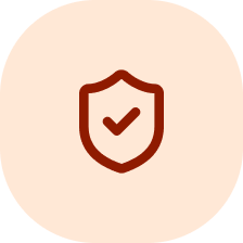 A red shield icon with a checkmark inside, set within a light pink circle.