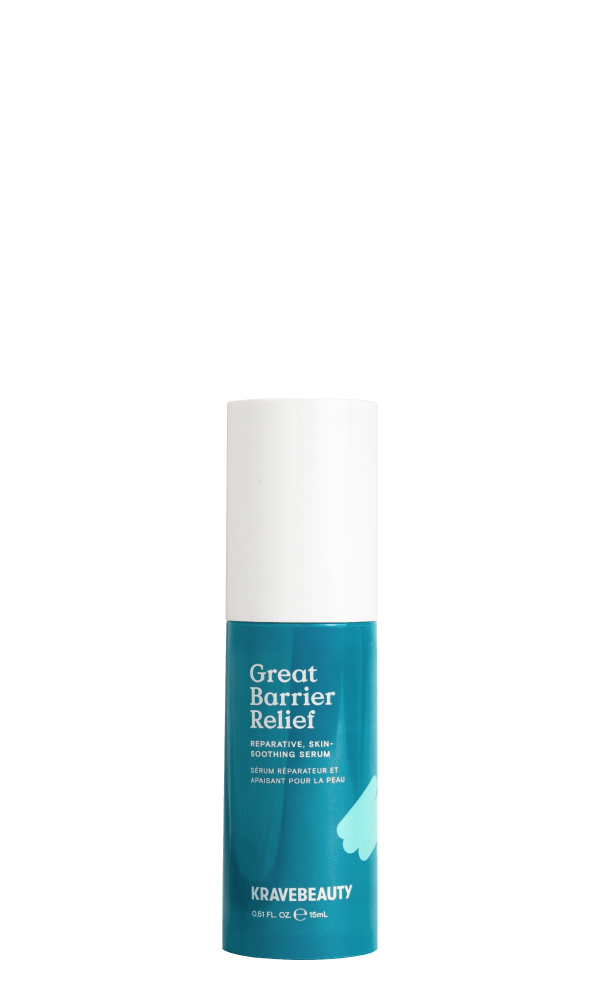 A blue skincare bottle labeled 'Great Barrier Relief' by KraveBeauty.