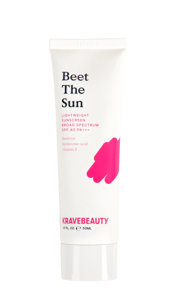 A white tube of sunscreen labeled 'Beet The Sun' by KraveBeauty.