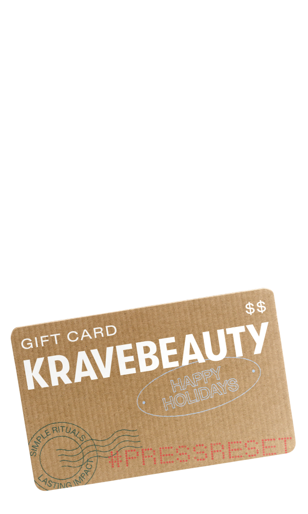 Gift card design with 'KraveBeauty' and 'Happy Holidays' text on a cardboard background.