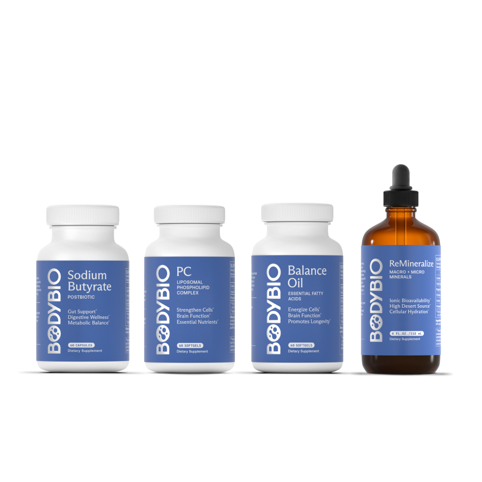 A lineup of four different BodyBio dietary supplements against a plain white background.