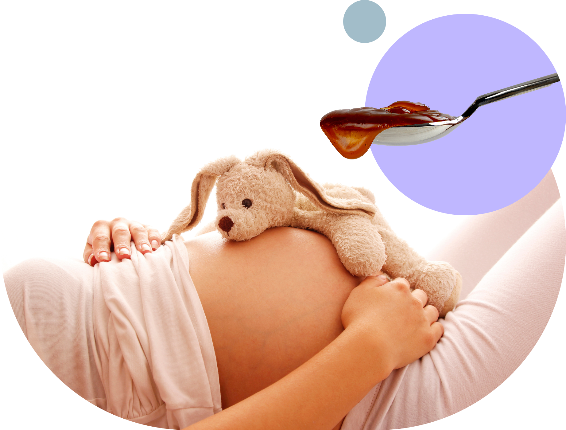 Pregnant belly with a stuffed bunny and a spoon with syrup.