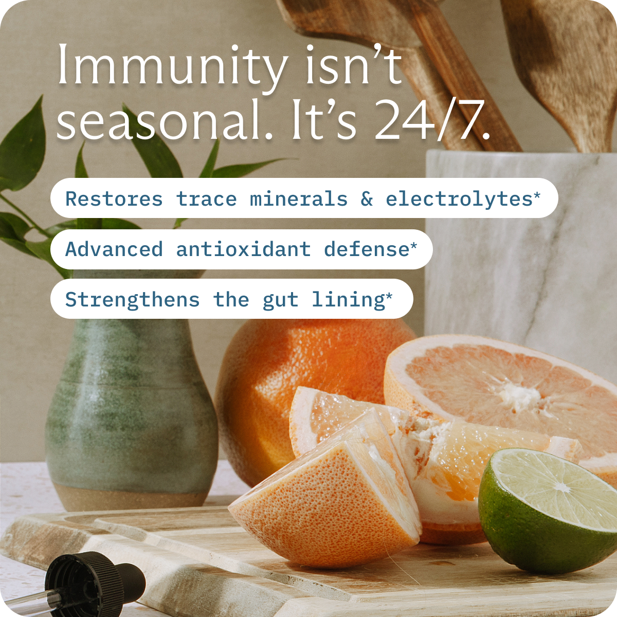 Sliced citrus fruits with text about immunity benefits on a countertop.