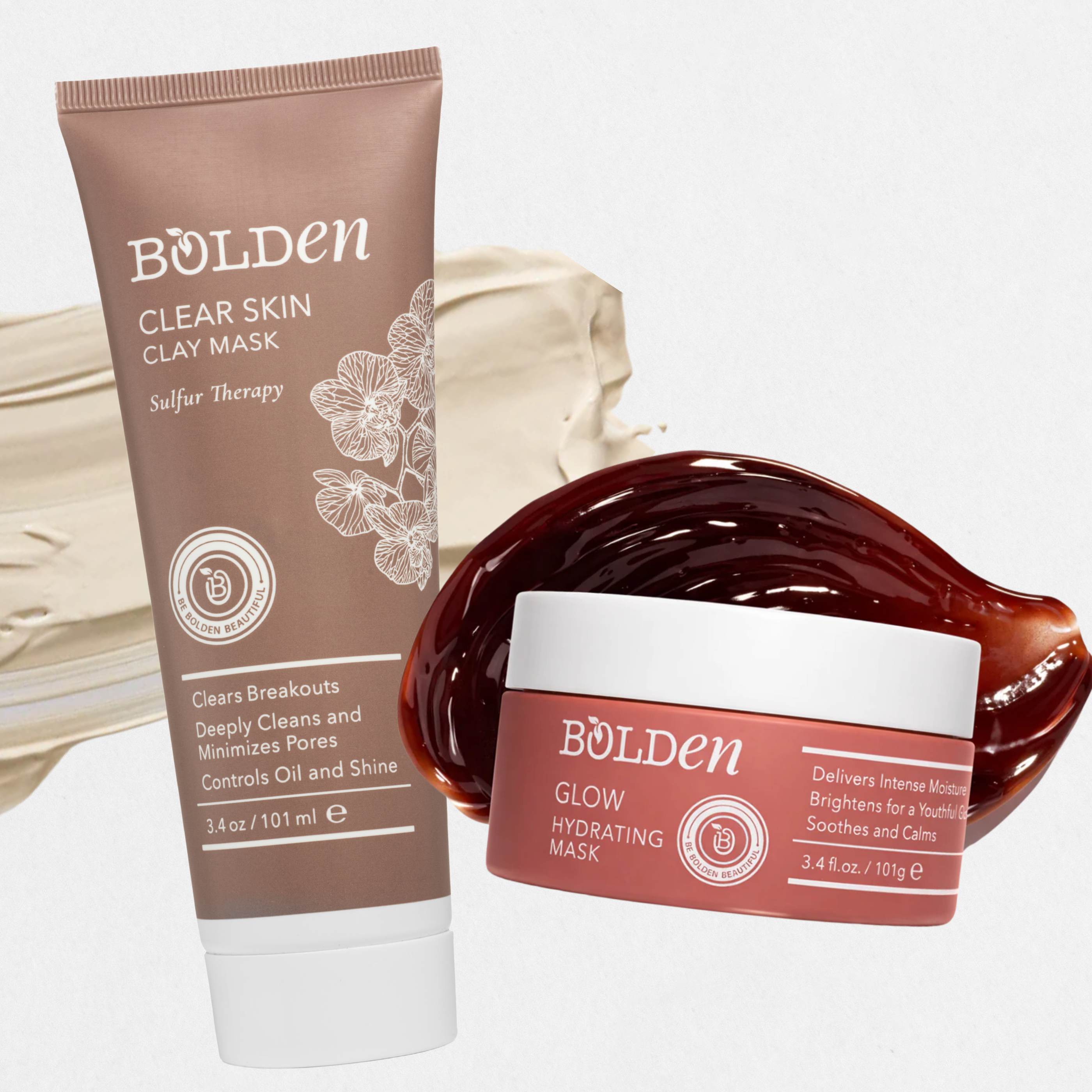 Bolden Clear Skin Clay Mask and Glow Hydrating Mask with swatches of the products behind them.