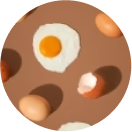 Eggs and a fried egg arranged on a brown surface.