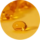 A close-up of a single translucent amber capsule on a yellow background.