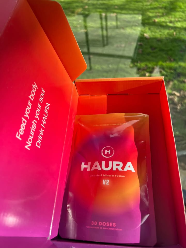 Colorful box with Haura supplement packet, text reads 'Feed your body, Nourish your soul, Drink Haura'.