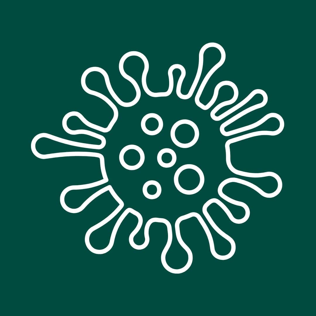 White abstract virus shape on a dark green background.