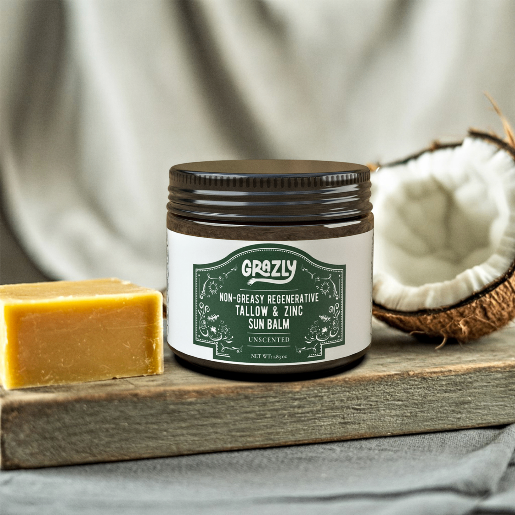 Jar of sun balm with coconut and soap on wooden surface.