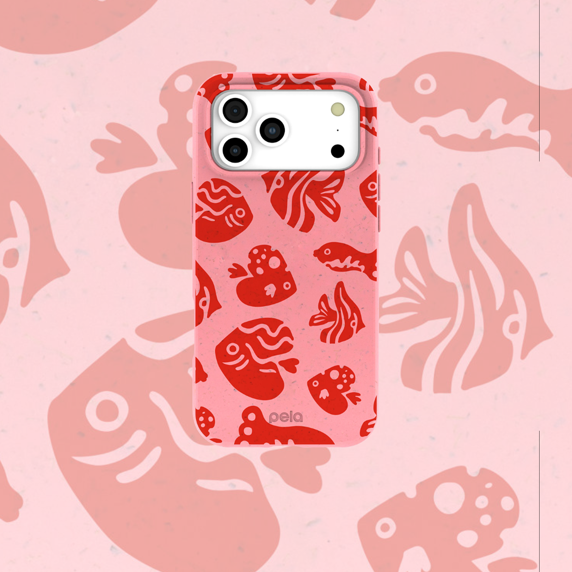 A pink phone case with a red fish pattern, shown against a matching pink fish-themed background.