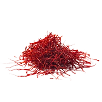 A pile of red saffron threads against a white background.