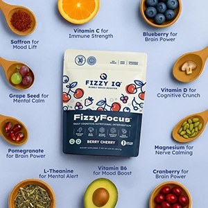 Fizzy Focus nutritional supplement surrounded by ingredients like blueberries, oranges, and cranberries.