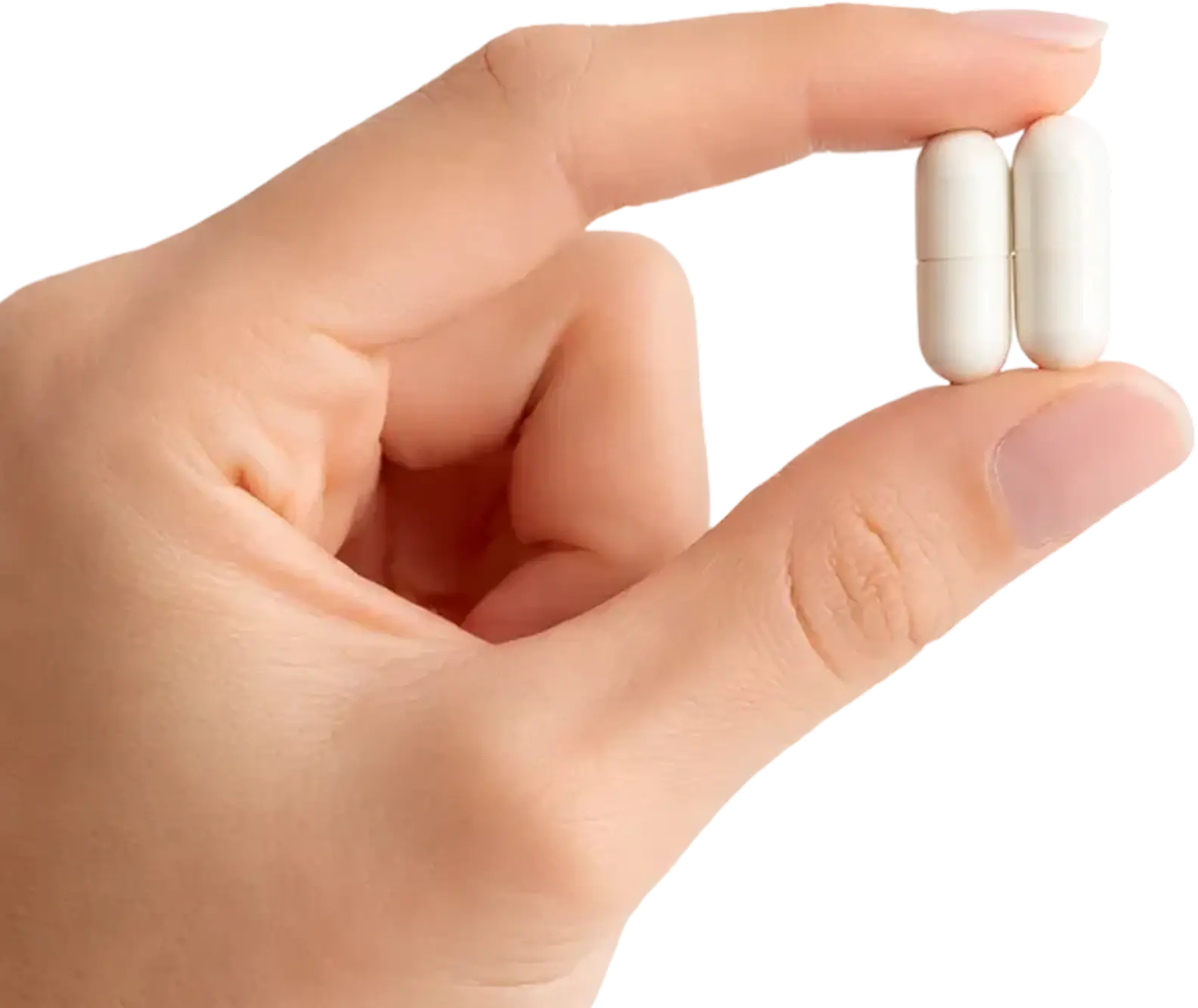 A close-up of a hand holding two white capsules between the thumb and forefinger against a white background.