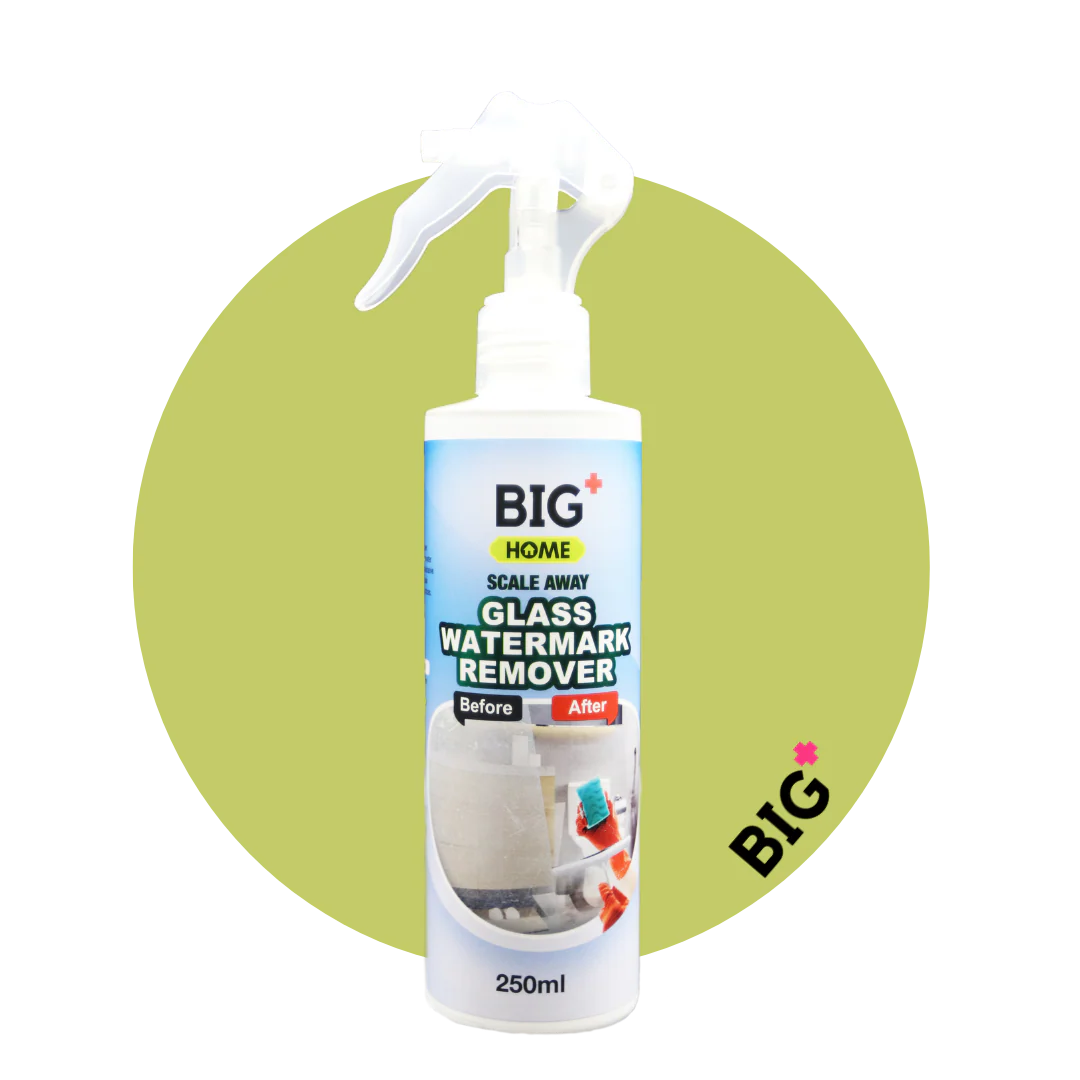 A spray bottle of BIG+ HOME Glass Watermark Remover cleaner against a green circular background.