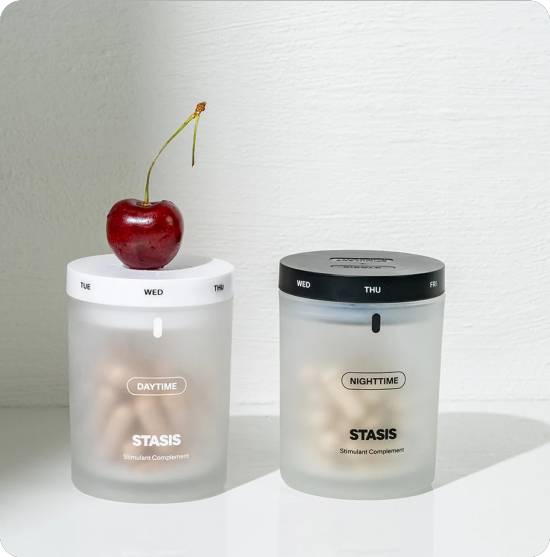 Two jars labeled 'Daytime' and 'Nighttime' with a cherry on one lid.