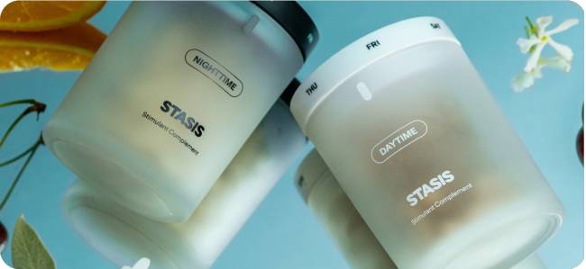 Two frosted containers labeled 'Daytime' and 'Nighttime' against a blue background with flowers and fruit.
