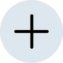 A gray circle with a black plus sign in the center.