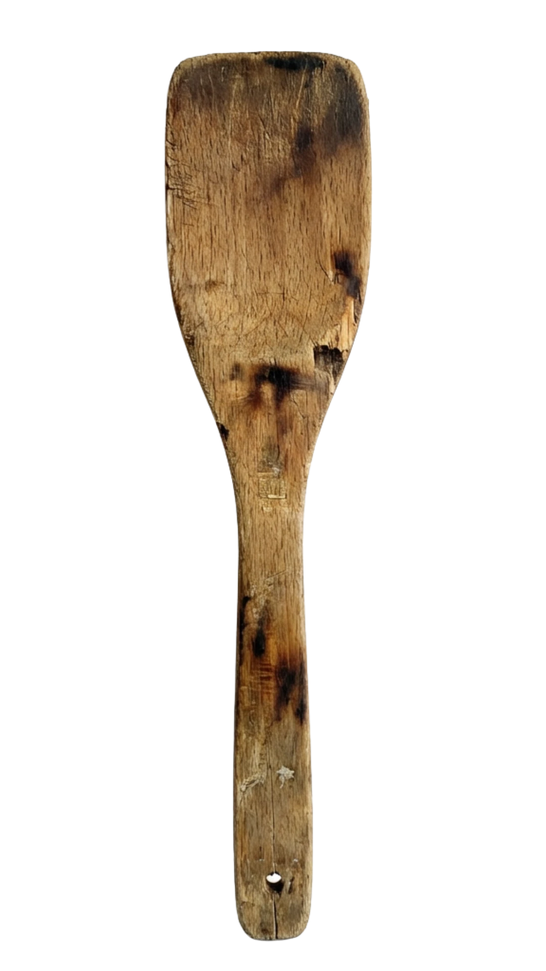 A worn and burnt old wooden spatula isolated on a white background.