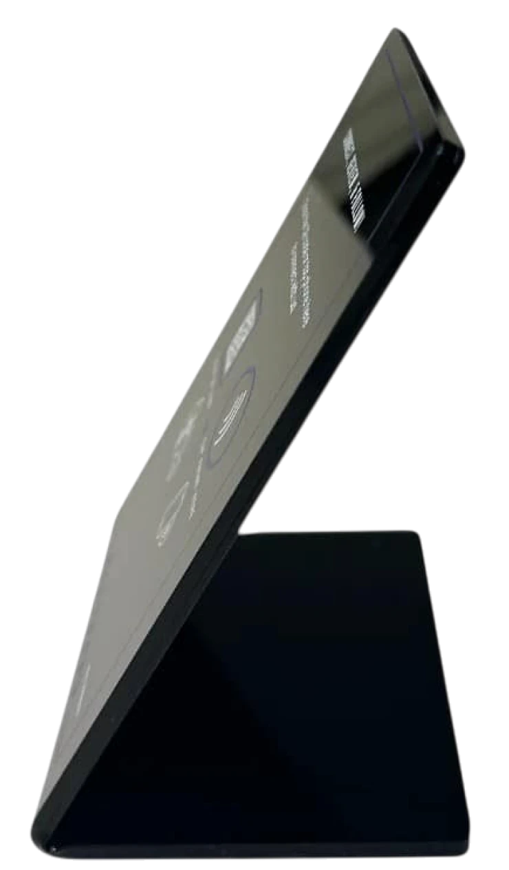 Side view of a black electronic device on a stand.