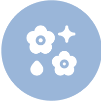 Two white flowers, a droplet and a star on a blue circle.