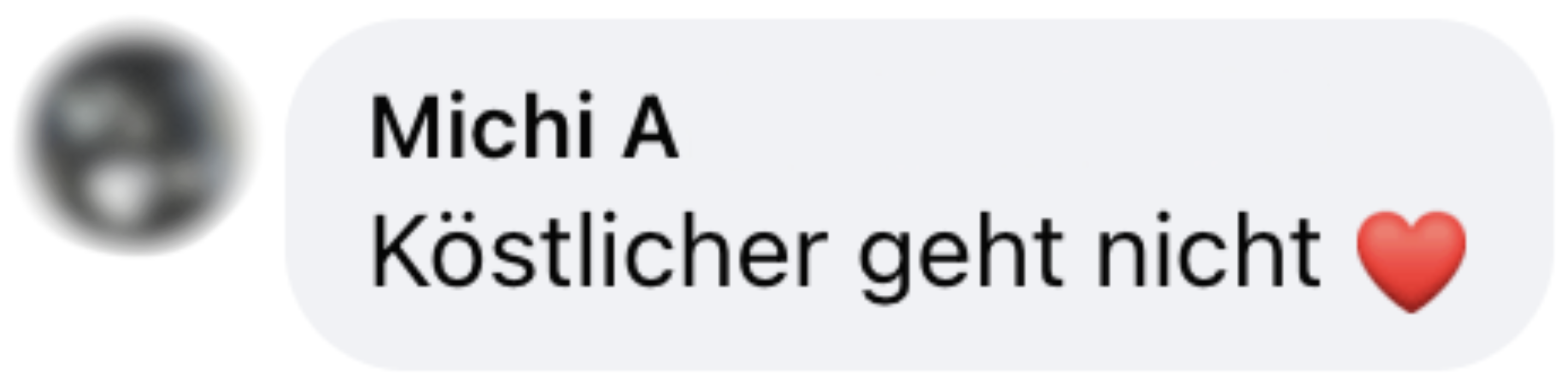 Text with German message and a red heart emoji.