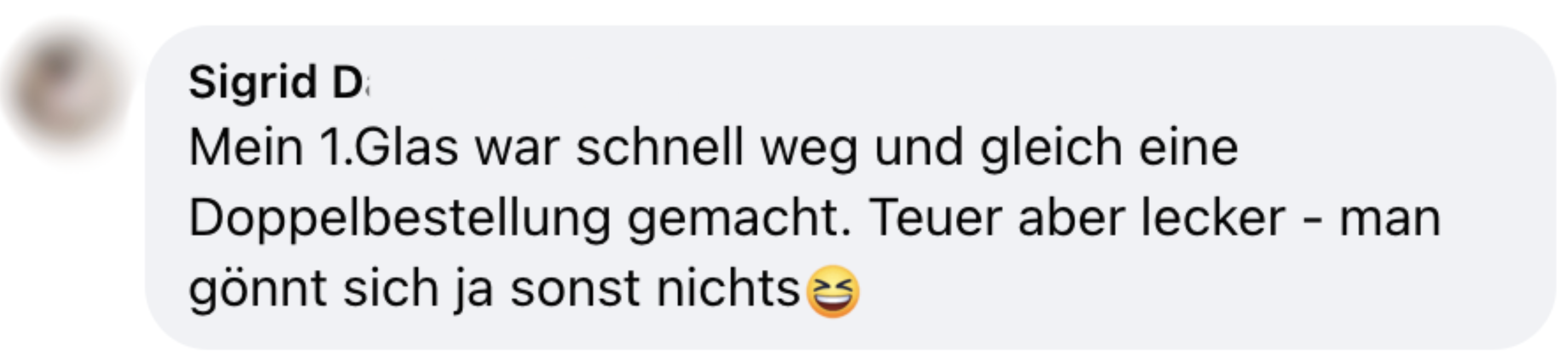 A blurred profile picture and a German text with a laughing emoji.