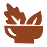 Brown bowl with three leaves inside.