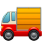 An emoji of a red delivery truck with a yellow cargo container.