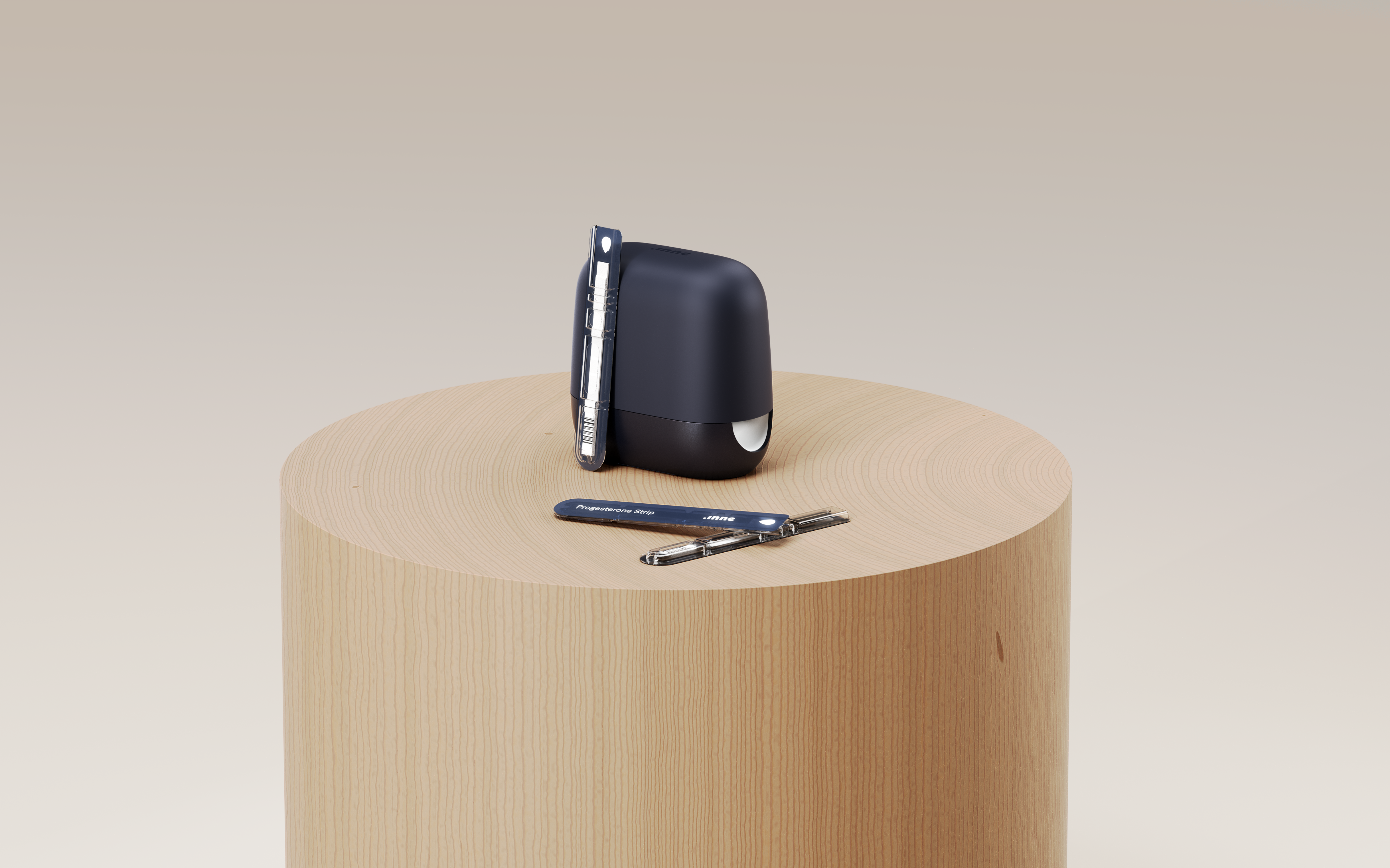 Black device and test strips on a wooden pedestal.