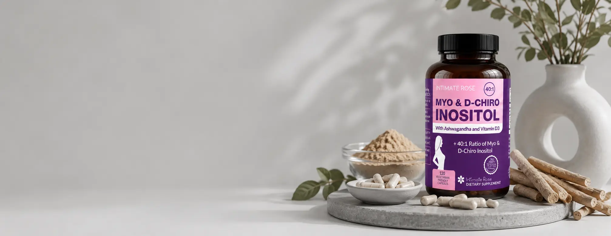 A bottle of Intimate Rose Myo & D-Chiro Inositol, with capsules, powder, plant roots, and a vase.