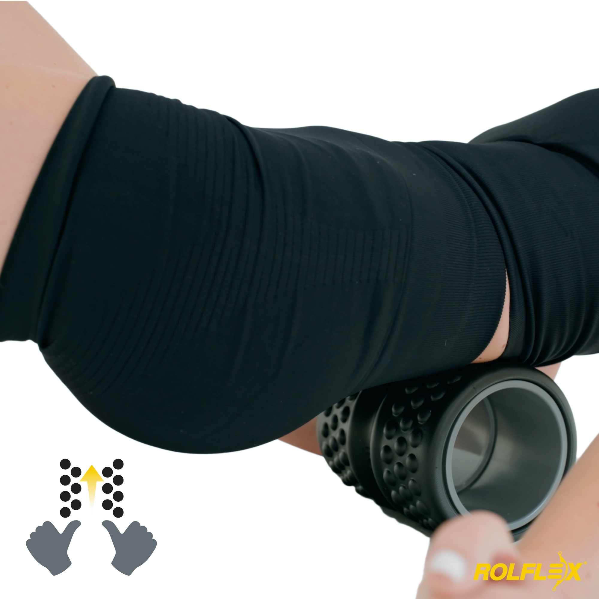 A person in a black sleeve massages their upper arm with a textured black roller.