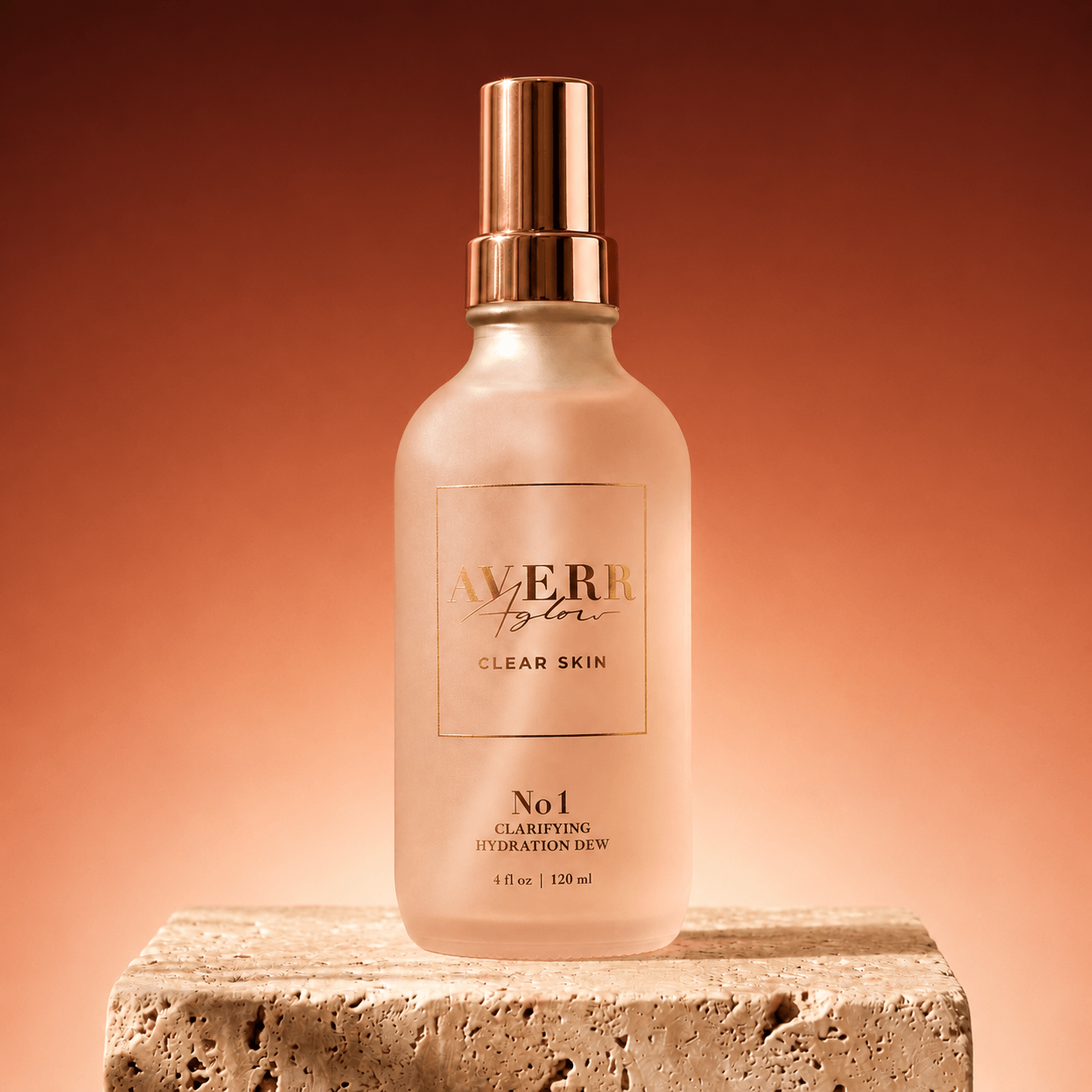 A bottle of Averr Aglow Clarifying Hydration Dew sitting on a rough, natural stone block.