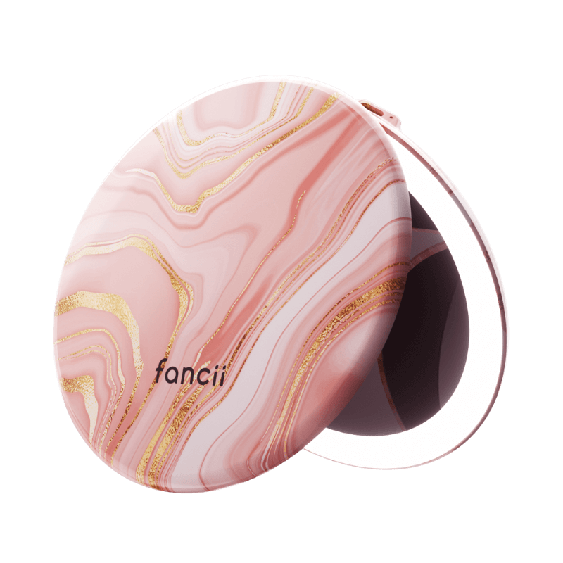 Pink and gold marbled compact mirror with a lighted edge.