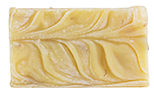 A rectangular bar of soap with a textured, swirled pattern.