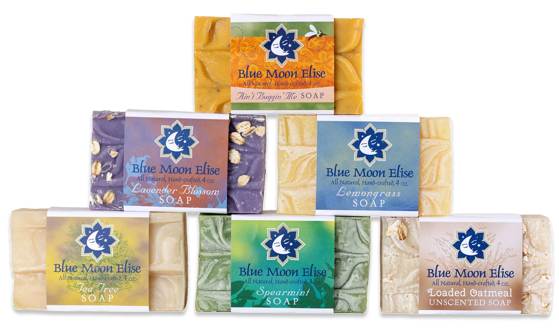 An arrangement of six different varieties of colorful, hand-crafted Blue Moon Elise soap bars against a white background.