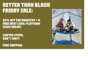 Advertising a sale with a photo of two people camping in a tent.