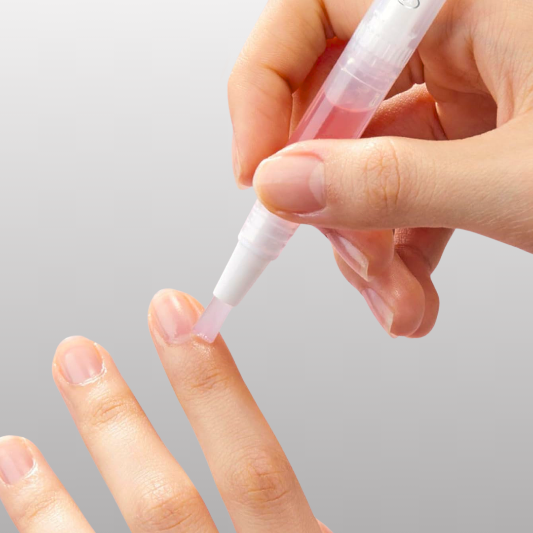 Close-up of a woman's lips with a dropper applying oil.