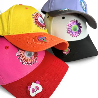 Colorful caps with floral and panda designs stacked together.